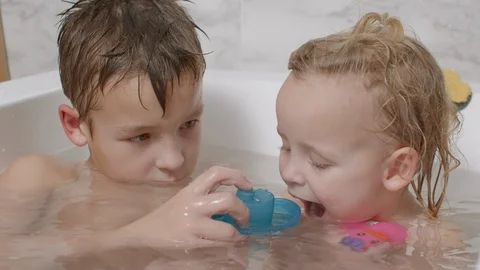small sister in bath 