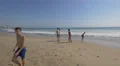 Boys and girls playing on the sandy beach, Porto 4k or 4k+ Resolution