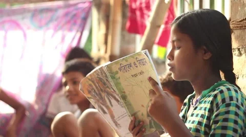 Boys and girls studying and reciting in a village school in Bengal Stock Footage