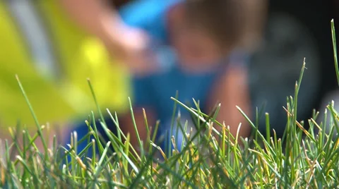 Boys in the background drawing with chalk. Stock Footage 27953934