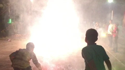 Boys burning firecrackers Video stock 98179127