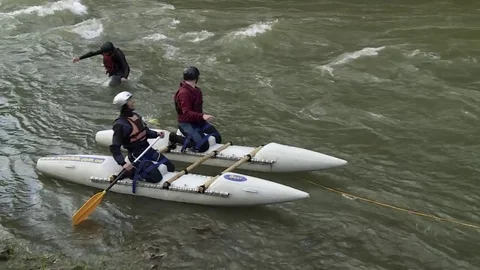 Boys on a catamaran Stock Footage 71630132
