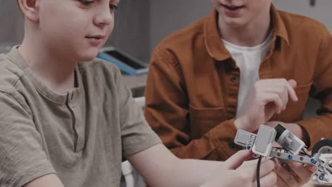 Boys Constructing Something At Class Video stock 203819215