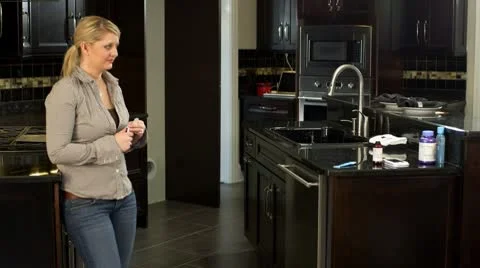 Boys with Cut get's Mom to help Stock Footage 10762555