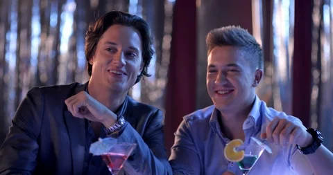 Boys Drinking And Talking While Checking Out Girls In Disco Stock Footage 91129565