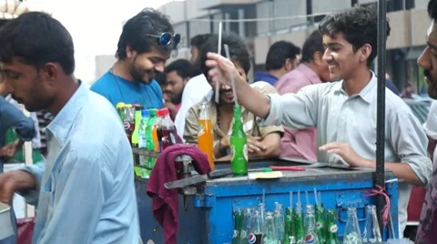 Boys enjoying cold drinks Stock Footage 53232789