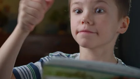 Boy’s Eureka Moment: Solving a Problem in His Room, Close-Up Stock Footage 303438239