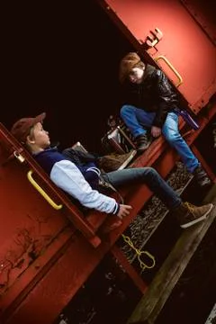Boys on freight train Stock Photos