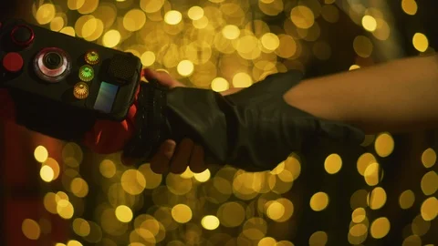 Boys hand with sensory stimulation machine holding other persons hand Stock Footage 108953407