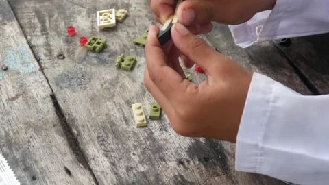 Boys hands playing with lego. Stock Footage 310520565