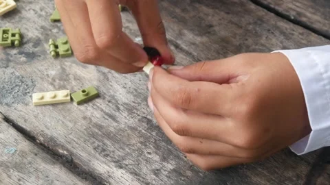 Boys hands playing with lego. Stock Footage 310520568