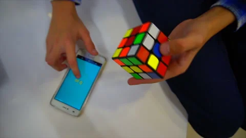 Boys hands solving rubik cube Stock-Footage 97034061