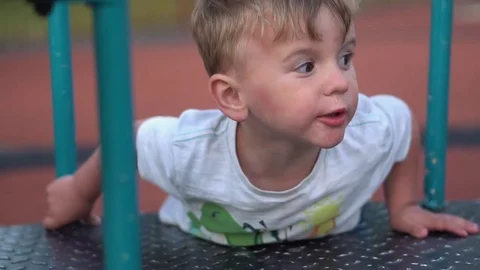 Boys having fun on the playground Stock Footage 79976322