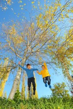 Boys jumping Stock Photos