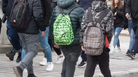 Boys leaving school Stock Footage 102940026