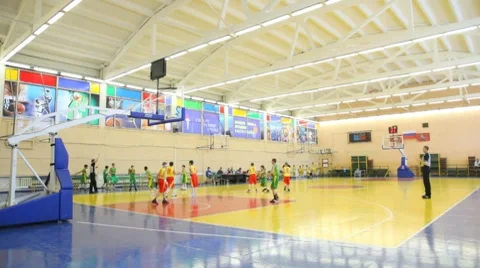 Boys play basketball in RSUPES&amp;T Stock Footage 7737461