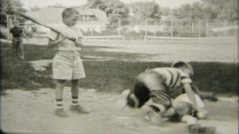Boys play a classic sandlot baseball game at local field 1950s  home movie 5635 Stock Footage