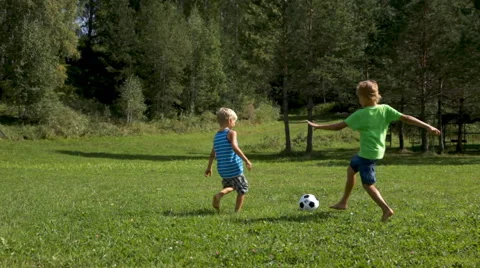 Boys playing soccer Stock Footage 46913559