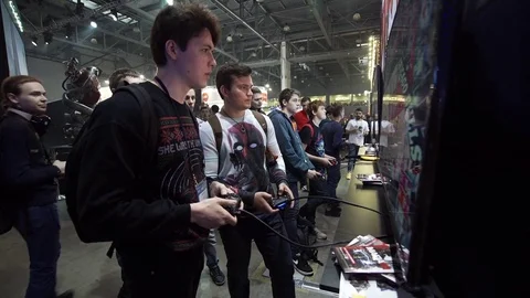 Boys playing video games using joystick Stock Footage 72287307