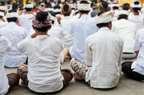 Boys praying Stock Photos