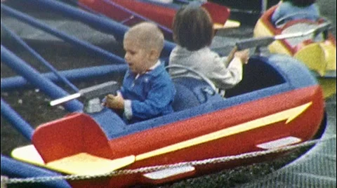 https://images.pond5.com/boys-ride-rocket-kiddie-park-footage-008646962_iconl.jpeg