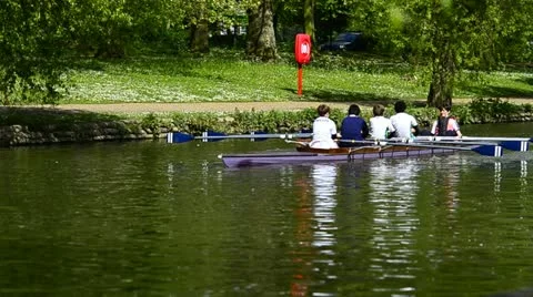 Boys rowing a boat on river Stock Footage 11081839