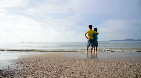 Boys stand on the beach Stock Footage 56958651