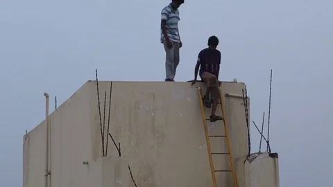 Boys stepping down from ladder Video stock 80718224