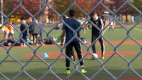 Boys training playing soccer Stock Footage 69814566