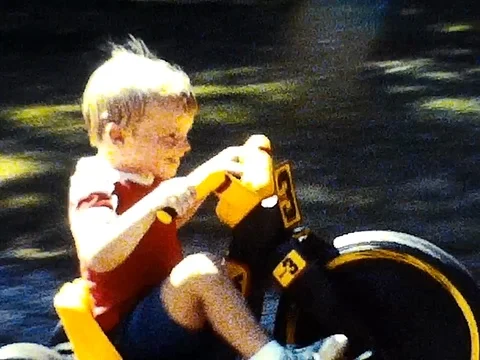 Boys on tricycles Stock Footage 78005371