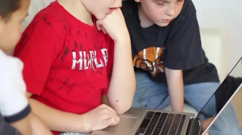 Boys using laptop computer Video stock 40712198