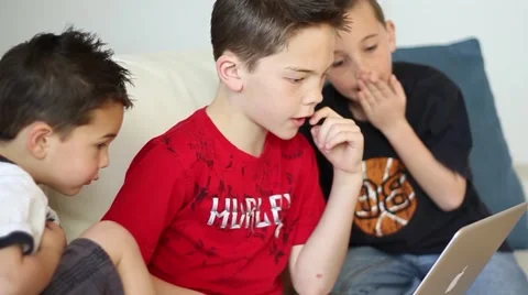 Boys using laptop computer Video stock 40712256