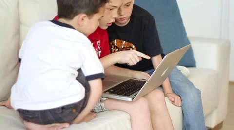 Boys using laptop computer Video stock 40712290