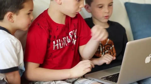 Boys using laptop computer Video stock 40712324