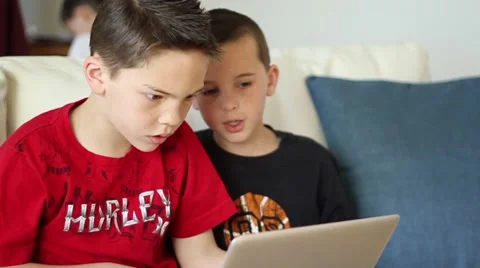 Boys using laptop computer 動画素材 40712339