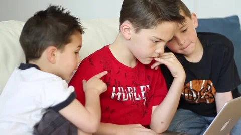 Boys using laptop computer Video stock 40712342