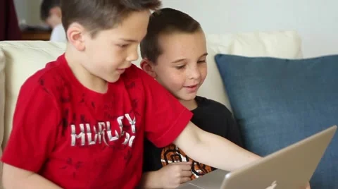Boys using laptop computer Video stock 40712352