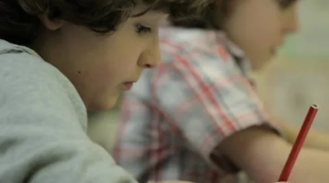Boys writing Stock Footage 22663957