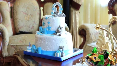 Boys's first birthday cake Stock Footage 84354306