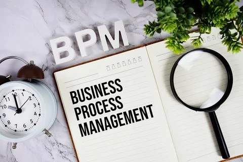 BPM - Business Process Management acronym on notepad, Business concept back.. Stock Photos