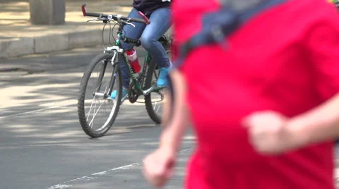 BPMX40-Mexico, few bikes pass laterally. Tripod, mid shot, no faces. Stock Footage 47857633