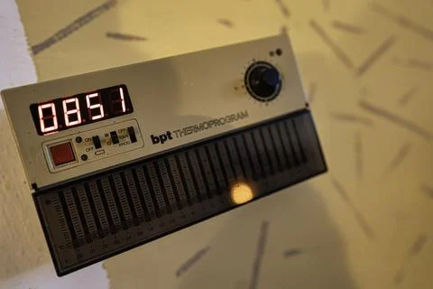 Bpt thermoprogram vintage digital wall thermostat controlling temperature Stock Photos