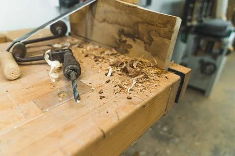 Brace - old woodworking tool instead of automatic drilling machine - placed on Stock Photos