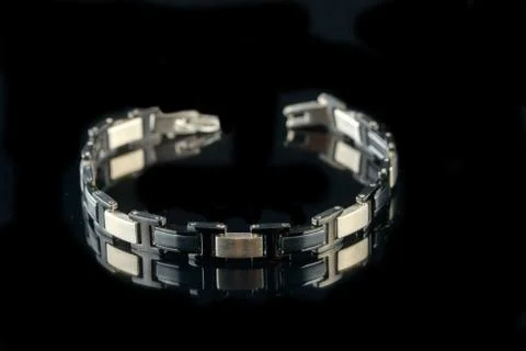Bracelet on a black background Stock Photos