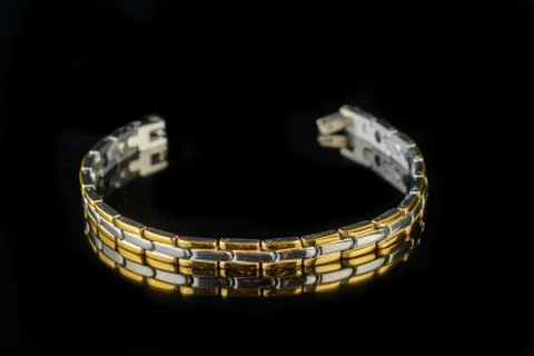 Bracelet on a black background Stock Photos