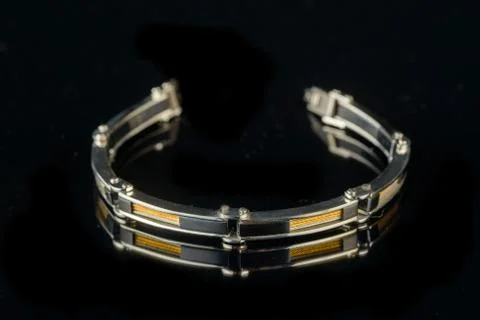Bracelet on a black background Stock Photos