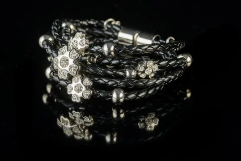 Bracelet on a black background Stock Photos