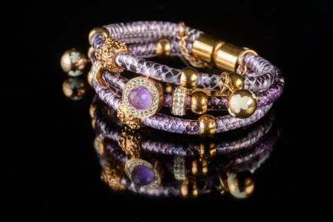 Bracelet on a black background Stock Photos