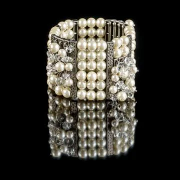 Bracelet on black background Stock Photos
