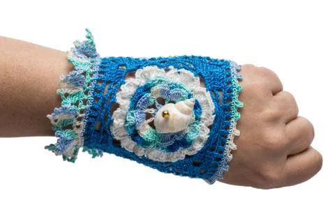 The bracelet embroidered with threads Stock Photos